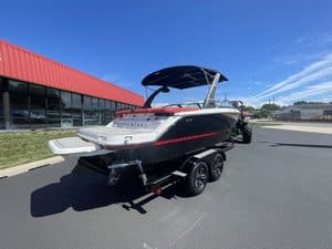 Luxury 2022 Four Winns H2 boat on trailer at Hall's Sport Center.