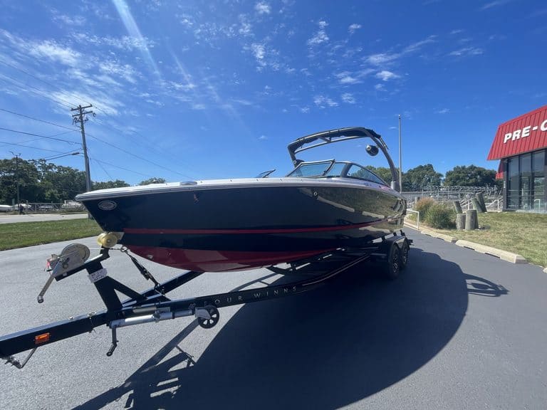 Luxury 2022 Four Winns H4 boat on trailer at Hall's Sport Center.