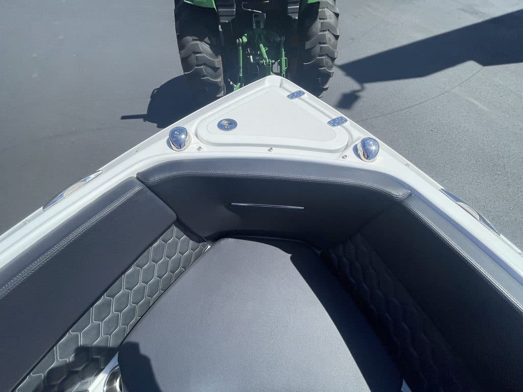 Close-up of the interior seating area of a Four Winns H4 boat.