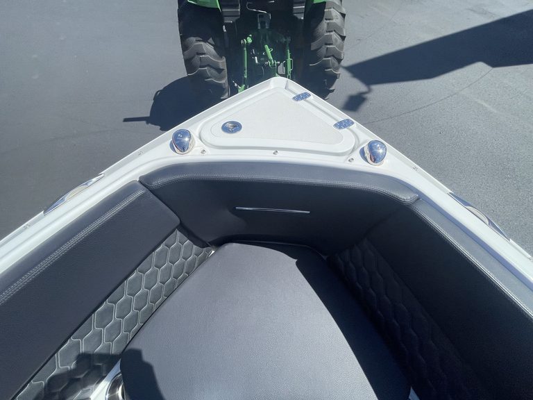 Close-up of the interior seating area of a Four Winns H4 boat.