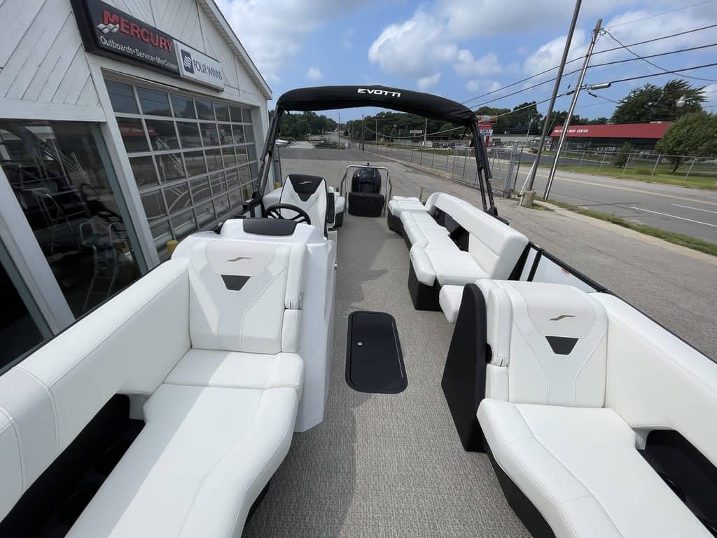 Luxury EVOTTI 523CL pontoon boat displayed at Hall's Sport Center.
