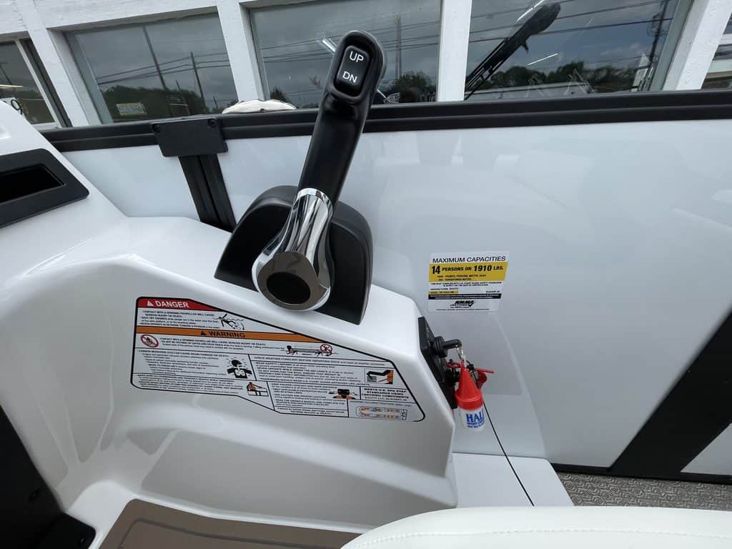 Close-up of EVOTTI 523CL golf cart control lever and dashboard.