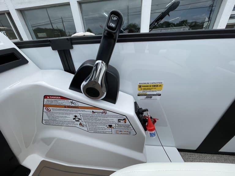 Close-up of EVOTTI 523CL golf cart control lever and dashboard.