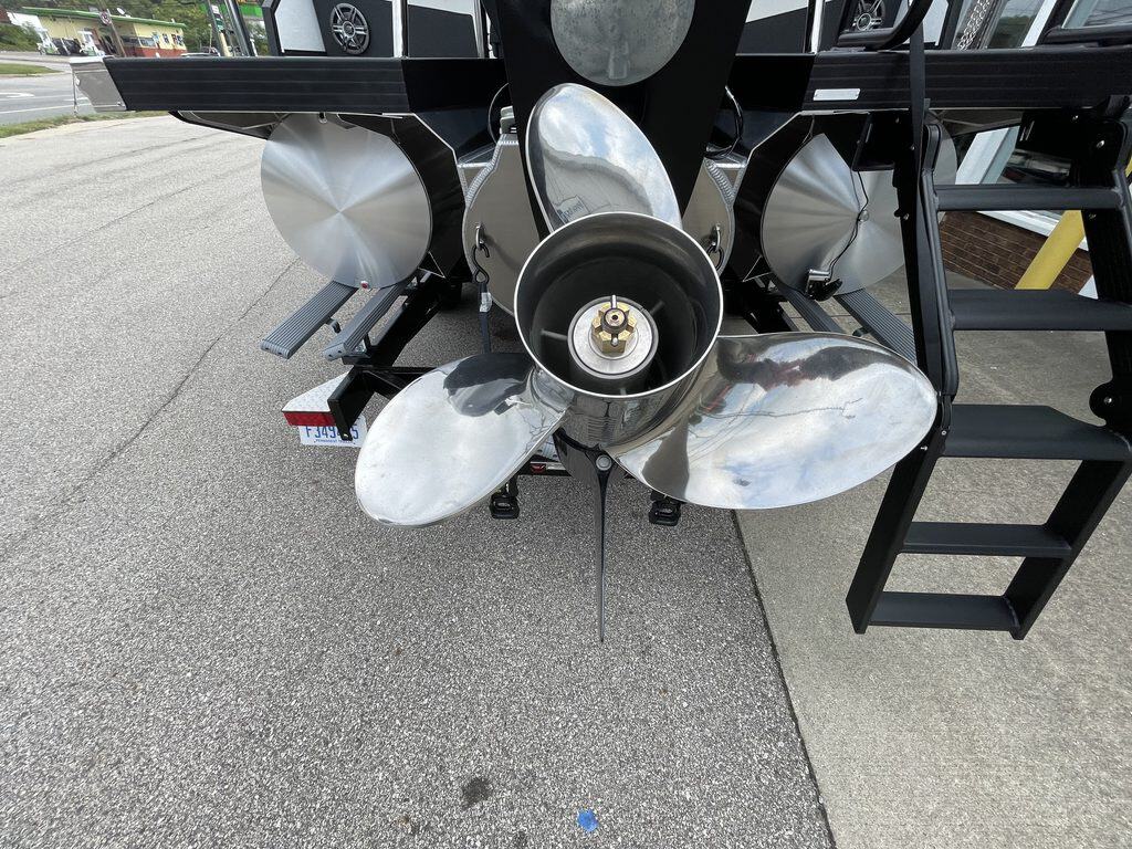 Close-up of boat propeller with four blades at Hall's Sport Center.
