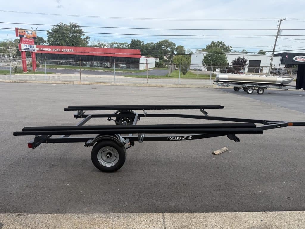 Boat trailer parked on the street near Hall's Sport Center.
