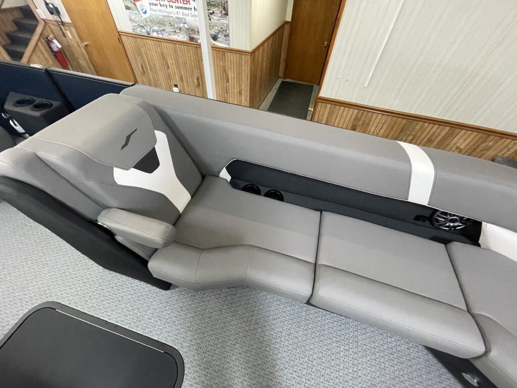 Comfortable boat seating at Hall's Sport Center with gray cushions.