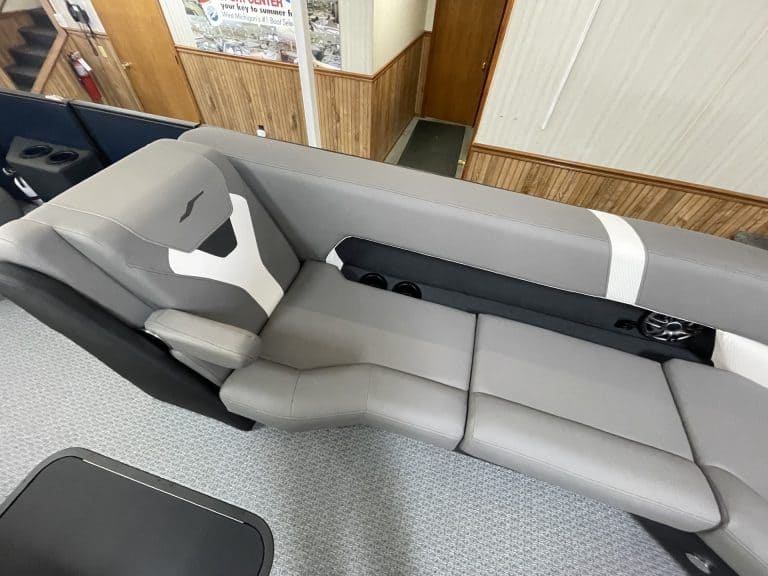 Comfortable boat seating at Hall's Sport Center with gray cushions.
