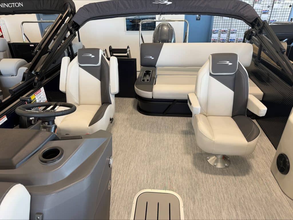 Bennington 22 S1SB boat interior with captain and passenger seats.