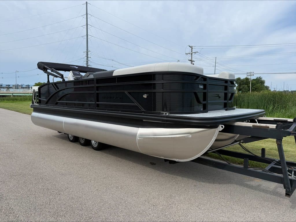 Bennington 22 S1SB pontoon boat on trailer in outdoor setting.