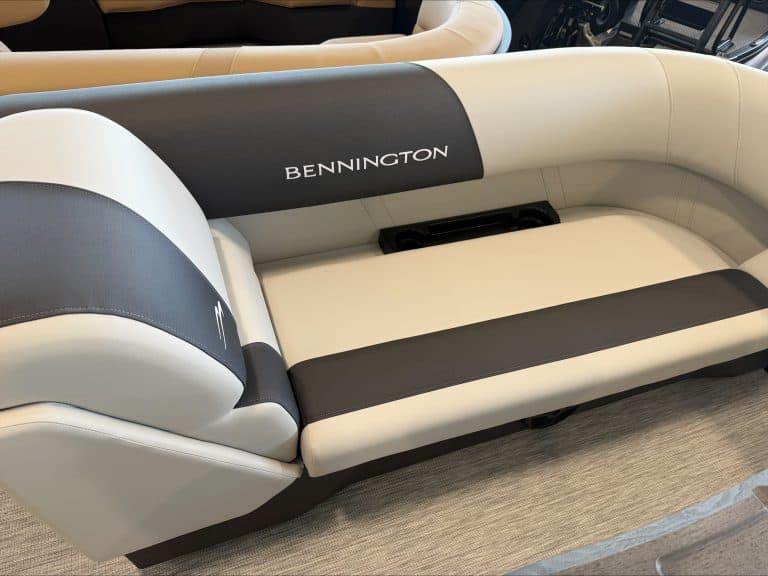 Bennington boat seating with brand logo at Hall's Sport Center.