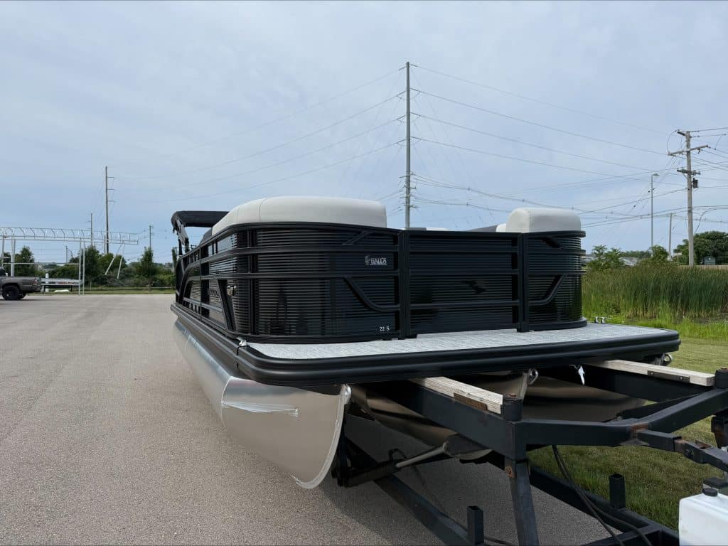 Bennington 22 S1SB pontoon boat on trailer at Hall's Sport Center.