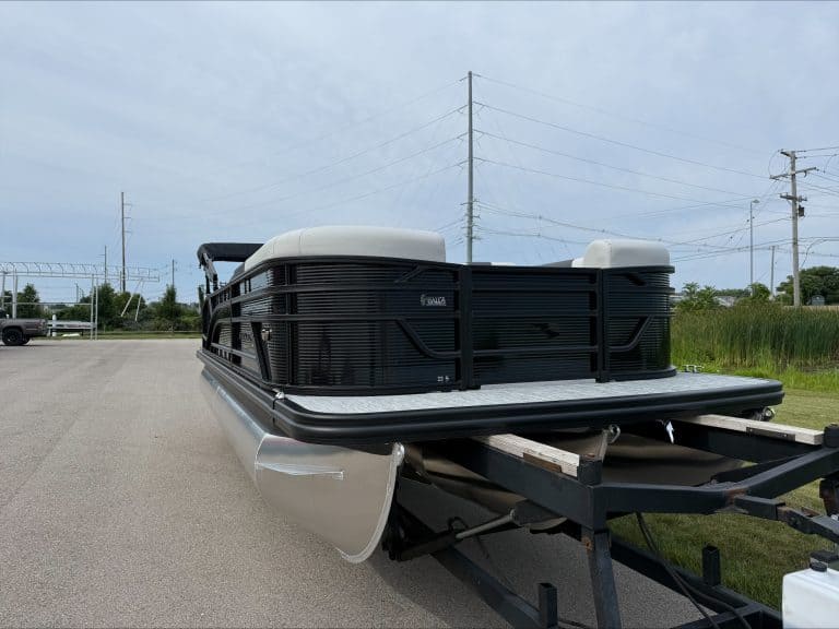 Bennington 22 S1SB pontoon boat on trailer at Hall's Sport Center.