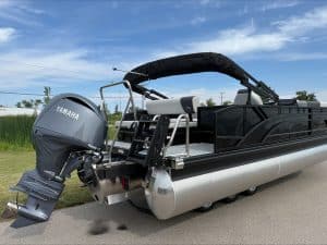 Bennington 22 S1SB pontoon boat with Yamaha engine on a trailer.