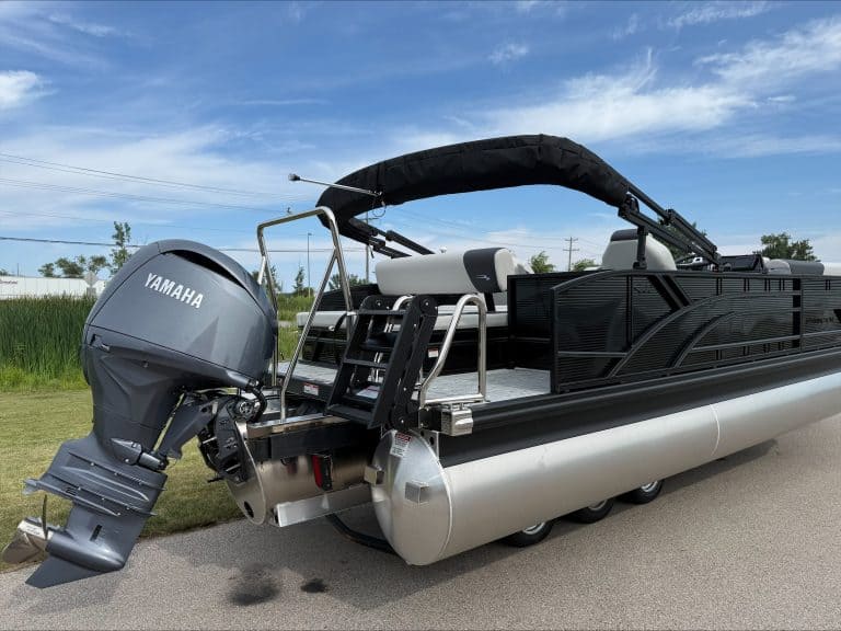 Bennington 22 S1SB pontoon boat with Yamaha engine on a trailer.