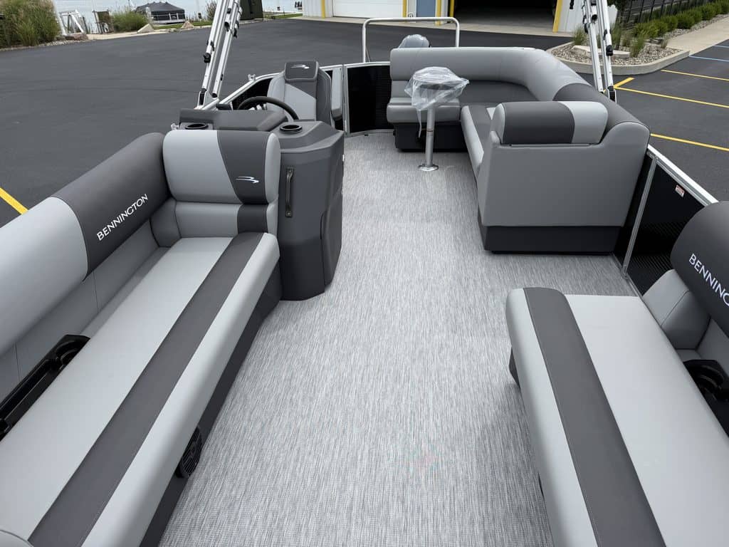 Bennington pontoon boat with spacious seating and modern design.