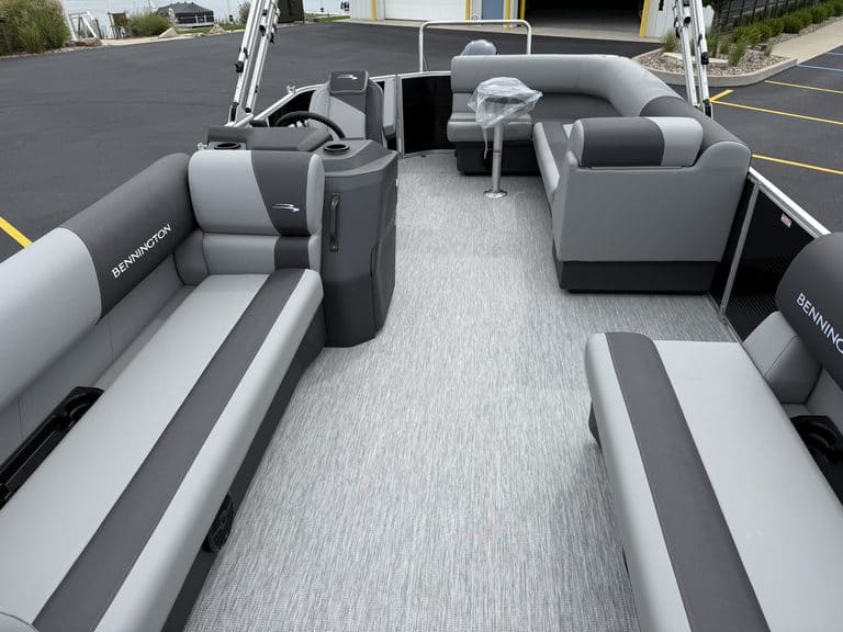 Bennington pontoon boat with spacious seating and modern design.