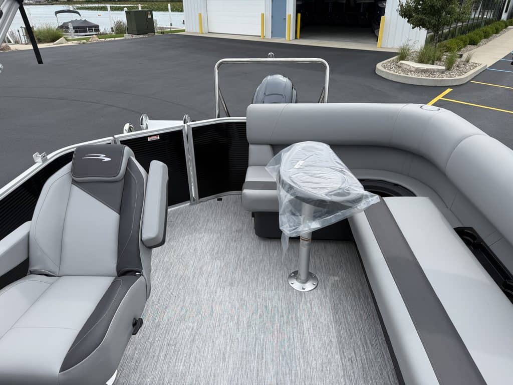 Bennington 20 S1L pontoon boat with seating and steering console.