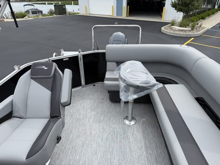 Bennington 20 S1L pontoon boat with seating and steering console.