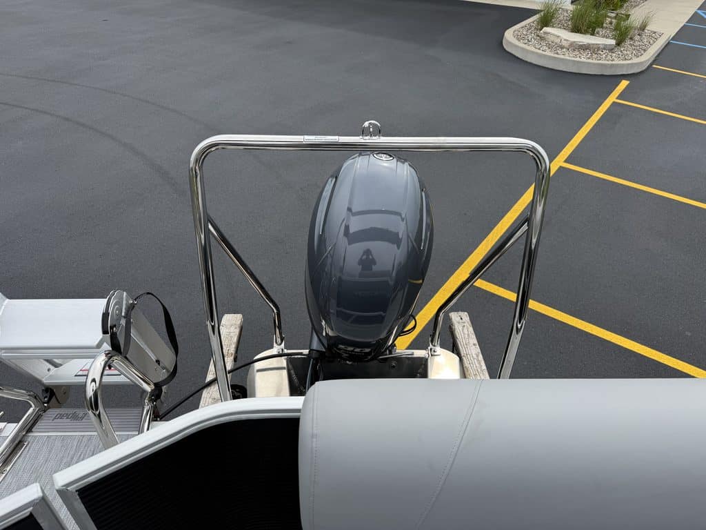 Bennington 20 S1L pontoon boat parked at Hall's Sport Center.