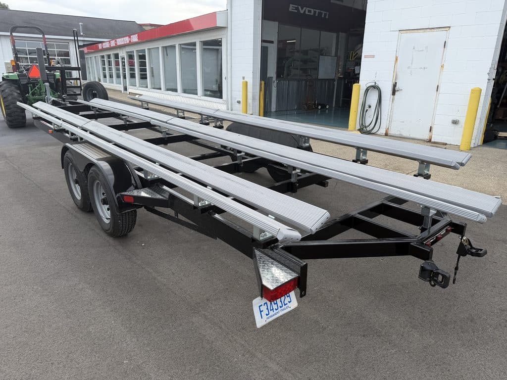Boat trailer with aluminum frame parked outside Hall's Sport Center.