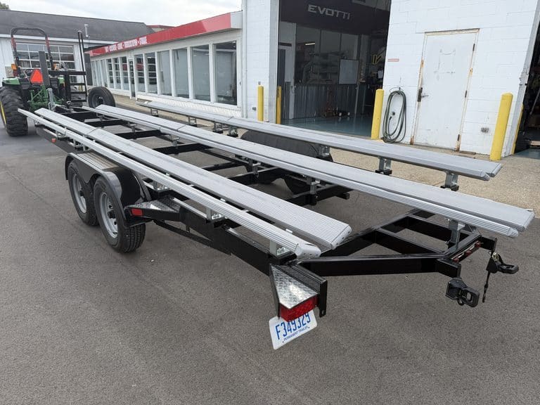 Boat trailer with aluminum frame parked outside Hall's Sport Center.