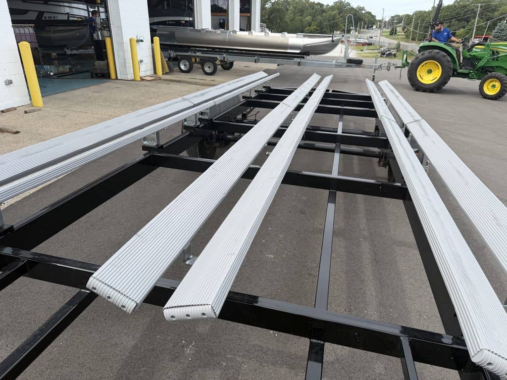 Aluminum boat trailer at Hall's Sport Center for boat transportation.