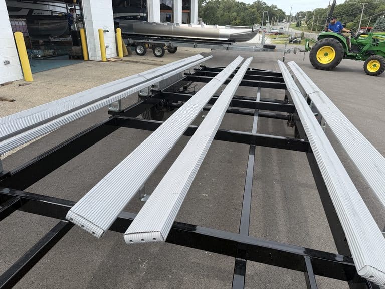 Aluminum boat trailer at Hall's Sport Center for boat transportation.