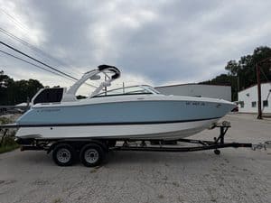 Four Winns H260 boat on trailer at Hall's Sport Center.