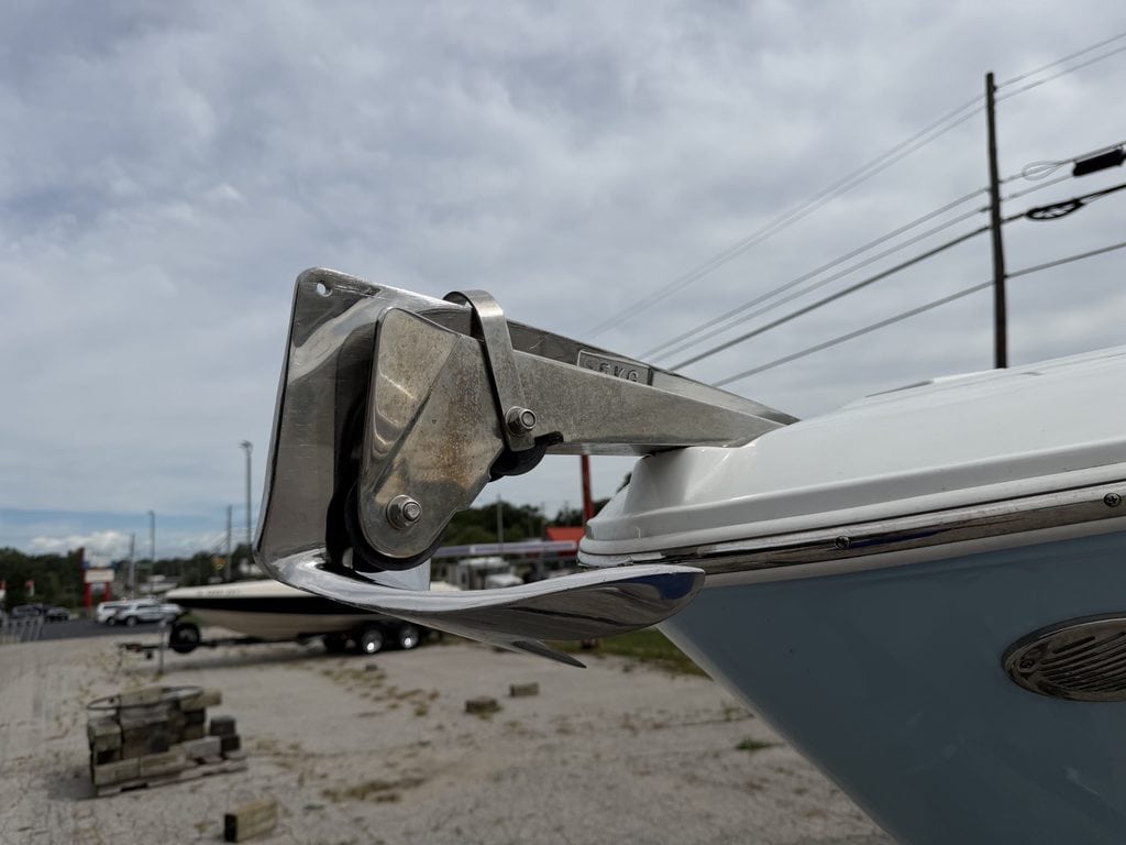 Close-up of the bow of a Four Winns H260 boat with anchor and hardware.