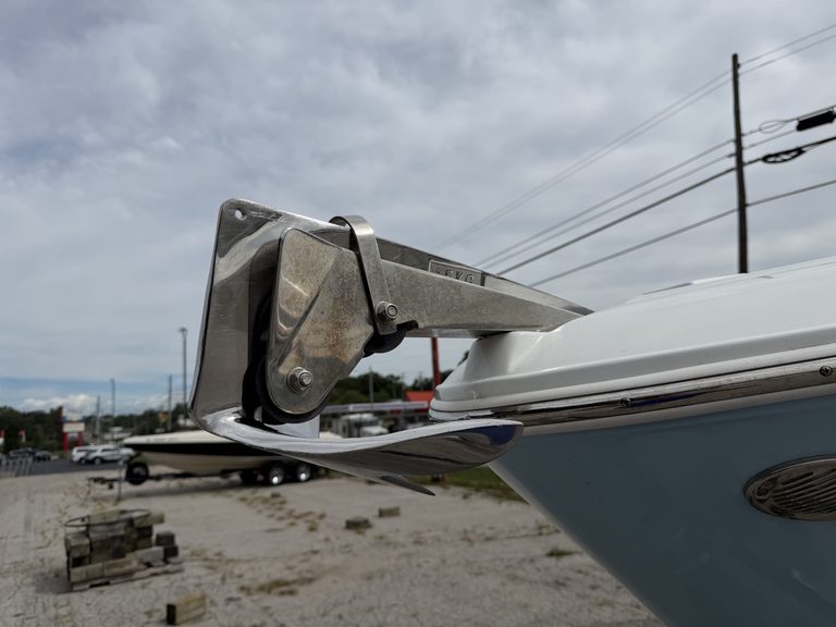 Close-up of the bow of a Four Winns H260 boat with anchor and hardware.
