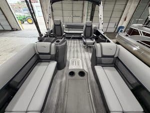 Bennington 23 SSB pontoon boat with spacious seating and modern design.