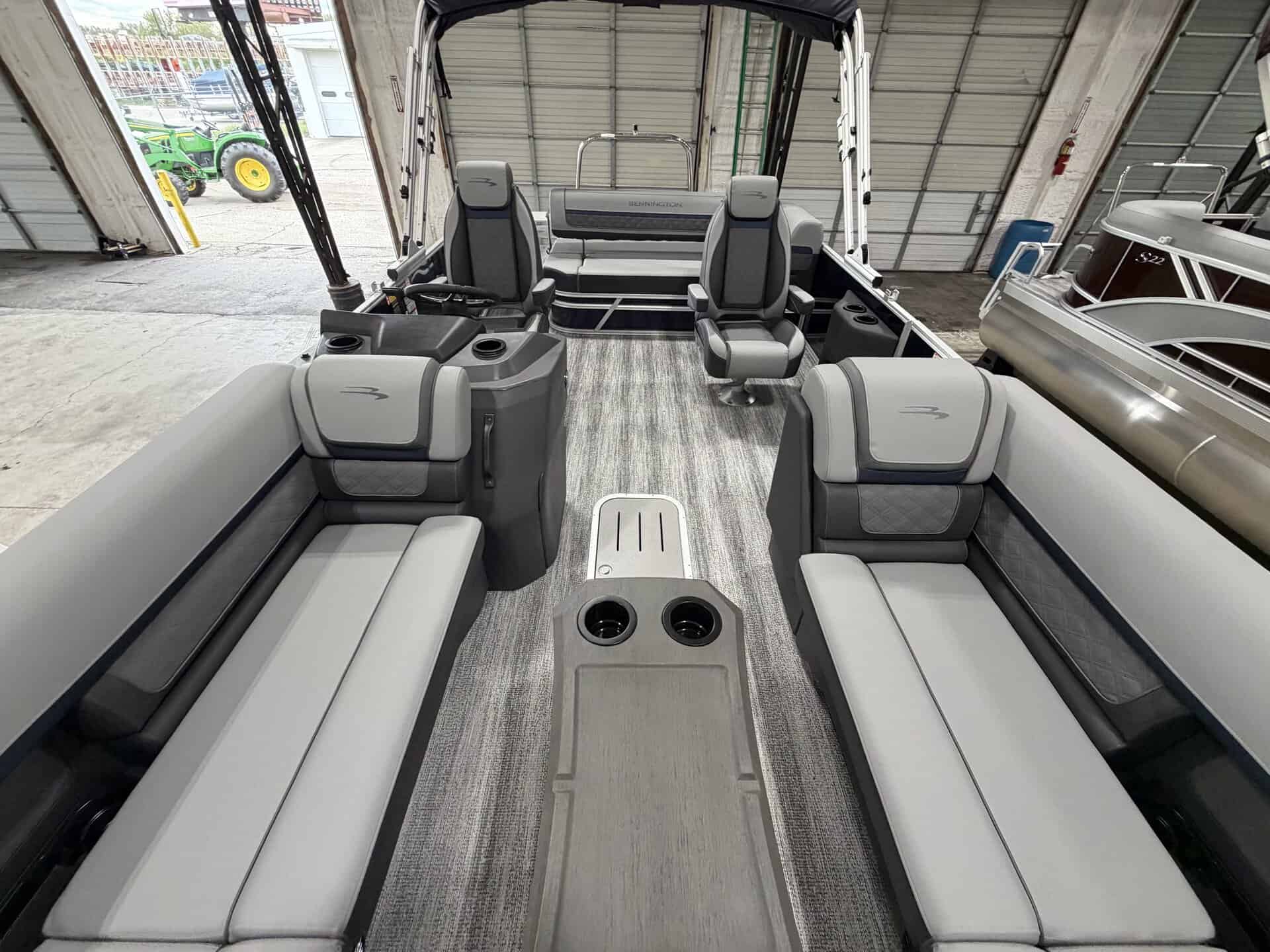 Bennington 23 SSB pontoon boat with spacious seating and modern design.