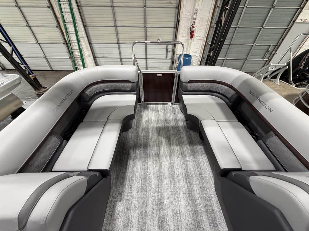 Bennington 22 SSR pontoon boat with spacious seating and modern design.
