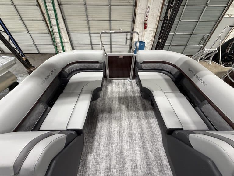 Bennington 22 SSR pontoon boat with spacious seating and modern design.
