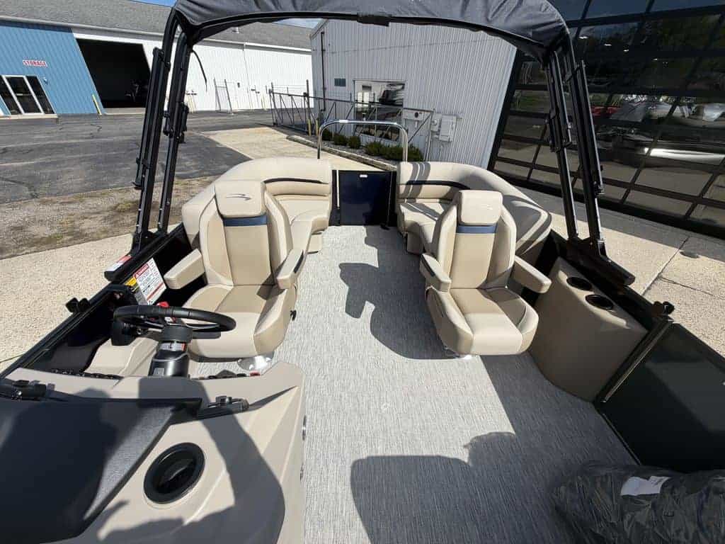Luxury Bennington 21 SSR pontoon boat with spacious seating and modern features.