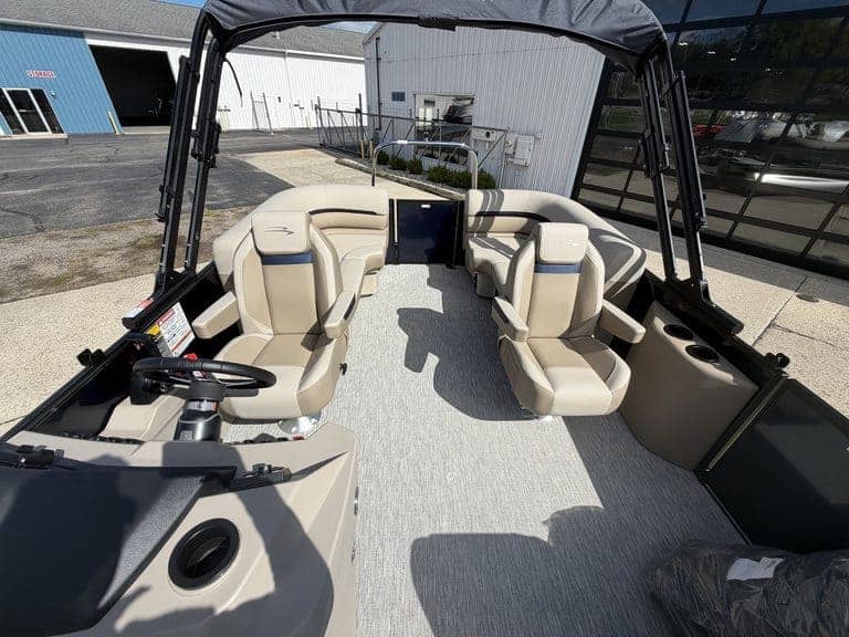 Luxury Bennington 21 SSR pontoon boat with spacious seating and modern features.