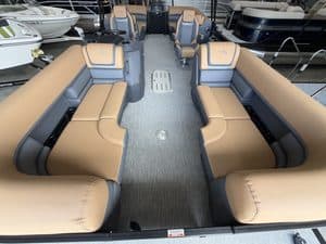 Luxury Bennington 22 SSR pontoon boat with spacious seating.