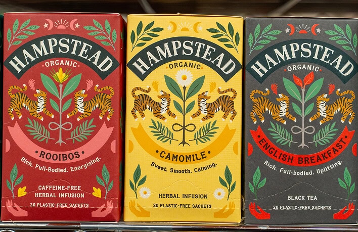 Assorted Hampstead organic herbal tea boxes with vibrant packaging.