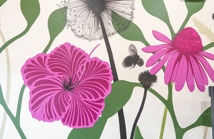 Colorful floral illustration with pink flowers and green leaves for Healthy Roots.