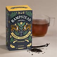 Hampstead Organic Black Vanilla Tea box with a glass of brewed tea and vanilla beans.