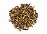 Dried licorice root pieces for herbal tea and remedies.