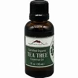 Pure tea tree oil in a small dark bottle for skin and hair care.