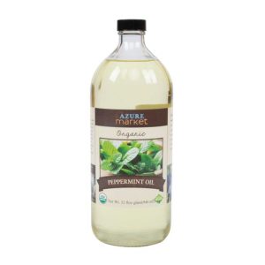 Organic peppermint oil bottle from Azure Market with label and black cap.