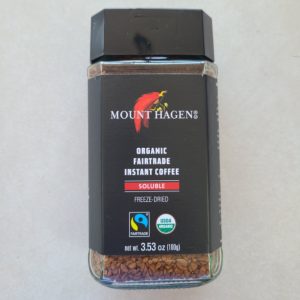 Mount Hagen organic fairtrade instant coffee in a glass jar with black lid.