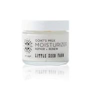 Healthy Roots Goat's Milk Moisturizer jar for skin hydration and nourishment.