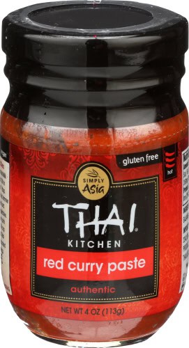 Thai Kitchen Red Curry Paste jar with black lid and red label.