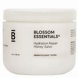 Hydration repair honey salve in a white jar for skin healing and moisture.