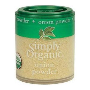 Organic onion powder in green and beige container for healthy cooking.