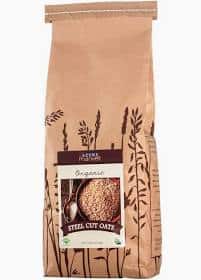 Healthy Roots organic steel cut oats in a brown paper bag.