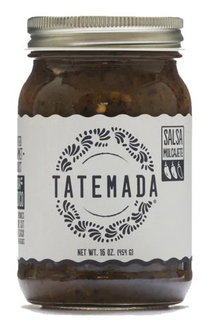 Authentic Mexican salsa in a glass jar with Tatemada label and silver lid.
